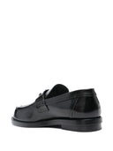 Alexander McQueen Loafer aus Leder mit Logo-Plakette