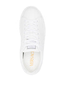 Sneakers impreziosite con Greca Versace