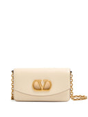 Valentino Garavani Vain Clutch em Couro de Bezerro Brilhante
