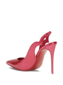 Christian Louboutin com salto fúcsia