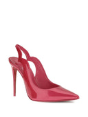 Christian Louboutin com salto fúcsia