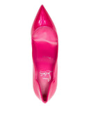 Christian Louboutin com salto fúcsia