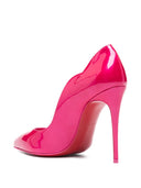 Christian Louboutin com salto fúcsia