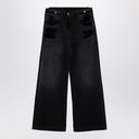 Jeans anchos de mezclilla negra lavada de The Attico