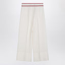 Брюки Valentino цвета слоновой кости с золотым V