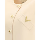 Abbigliamento in lana di pile crema