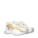 Zapatillas bajas de tela dorada