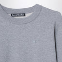 Sudadera gris de Acne Studios con parche pequeño de logo