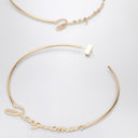 JACQUEMUS Gold hoop earrings with logo