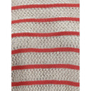Sweater in perforated knit
