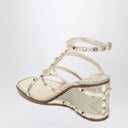 Valentino Garavani Rockstud wedge sandals in platinum color