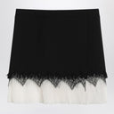 Alexander McQueen Mini skirt with black/ivory spider lace