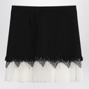 Alexander McQueen Mini skirt with black/ivory spider lace