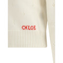 Jumper with a buttoned keyhole neck