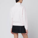 Sudadera rosa claro con media cremallera y parche con logotipo de Maison Kitsuné